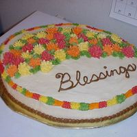 Blessings This was a cake for a family celebrating the day after Thanksgiving. It was my first time to make Crysanthemums (sp?)