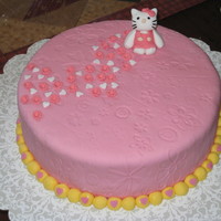 Hello Kitty I made this one for a client that wanted a small cake with a Hello Kitty figure on top. It is a chocolate cake with chocolate buttercream...