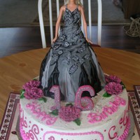 Sweet 16 Cake Barbie's cake dress was copied from a picture that the client sent of her daughter's dress that she would be wearing at her party...