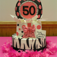 50Th Birthday buttercream with fondant decorations, balloon is 9" cake stood on end, covered in fondant