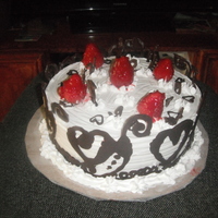 Coffee Chocolate Cake Coffee chocolate cake, butter cream with strawberry for frosting.