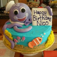 Nico's 1St Birthday Cake Birthday cake for a boy whose favorite toy is the octopus from Baby Einstien. Yellow butter cake recipe from Warren Brown's Cake Love...