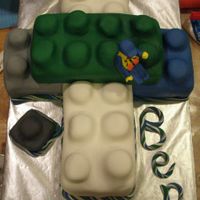 First Communion Cake First communion cake done like Legos. Yellow cake and fondant.