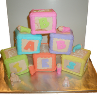 Baby Block Shower This was a cake done for a moms' club where they celebrate all expectant moms at a big party once each year. All the moms to be's...