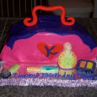 Purse Cake... This isn't a great cake, but it was a hard cake to stabilize...but fun to decorate. I love fondant...hate working with chocolate! I...