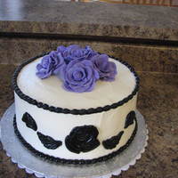 Roses Butter cream finish with fondant details, gumpaste roses