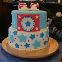 Converse Themed Cake Vanilla cake covered with fondant and gumpaste converse shoes!