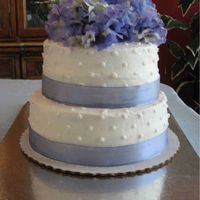 Hydrangea Shower Cake This was my first tiered cake without fondant. The outside and filling are BC. But the BC cracked-- I worked with it and worked with it and...