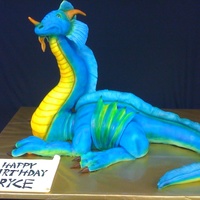 3D Dragon Dragon was 40 inches long, 2 feet tall to tip of head. Head is egg shaped styrofoam, 7 pounds of modeling chocolate in the neck structure,...