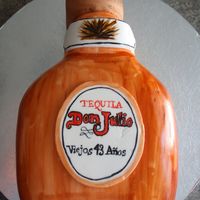 Tequila Bottle Cake I made a lime margarita cake with strawberry lime filling for this design. It was WONDERFUL!