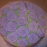 Practice Cake I'm having trouble with buttercream roses. I can't get the centers stiff enough - I even tried freezing them! Also, my roses are...