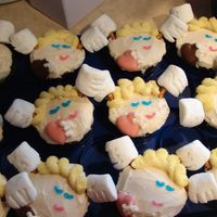 Cupid Cupcakes These cupids are chocolate cupcakes with vanilla cream filling and buttercream frosting.