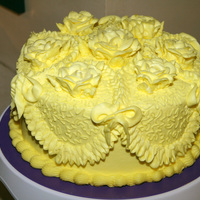 2Nd Practice Cake My second practice cake in preparation for the big anniversary/wedding cake I'm doing. I got tired of working with white,so I decided...