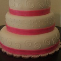 Swirls And Dots white with pink ribbon(with pearl mix) and royal icing dots and swirls, made for an anniversary, but can be used for birthdays and other...