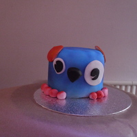 Airbrush Monster A 4in dummy covered in white fondant then airbrushed the features are all fondant [black for the nose the rest white and airbrushed]. Done...