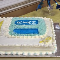 Baby Bottle buttercream cake. I used the wilton pan on top of an 11x13 half sheet cake.