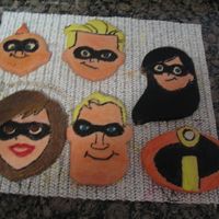 Incredibles A friend's son was having an incredibles party so I made these to add to his gift basket. The cookies are painted with thinned royal...