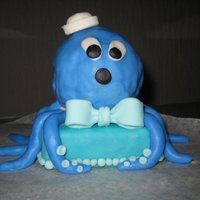 Octopus, Babies 1St Birthday. Little Mini Octopus cake for the 1yr old i Nanny for. Madeira Cake, with 'Cake Balled' head covered with Fondant.