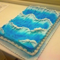 Waves Yellow cake with white whipped icing. Originally I was just experimenting and found a neat trick to getting realistic waves!