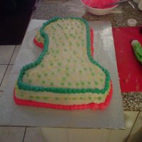 1St Birthday Cake my first cake ever, not the best but it was good, french vanilla cake mix, buttercream icing. decoraited with leaf green , blue, pink and...