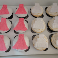 Royal Wedding Cupcakes Chocolate with Peanutbutter and Fondant Pink Dresses and Vanilla with Vanilla Buttercream and Fondant Wedding Cakes.