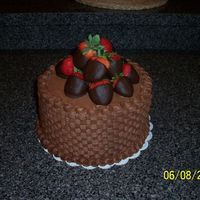 Basketweave Chocolate Buttercream This was a basketweave chocolate b/c w/ choc dipped strawberries. Chocolate cake w/ oreo cookie filling.