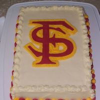 Florida State Carrot Cake Florida State buttercream transfer on a carrot sheetcake.