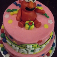 Elmo 2 tier elmo cake! cake is marble, buttercream icing with fondant decorations. my first paid cake :).