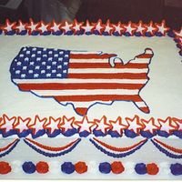 Patriotic Cake Buttercream icing with 50 royal icing stars around the border. The map of the US done in the style of the flag. Winner of the 2004 4th of...