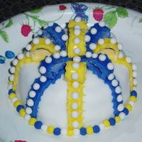 First Fondant Cake This is my first fondant cake or any kind of decorated cake for that matter. Comments are greatly appreciated. Thanks!