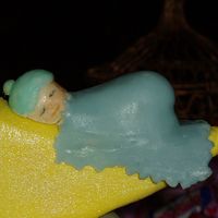 Close Up Of Baby This is a close up of the fondant baby I made for the baby boy shower cake. He's shiny because the paint hasn't quite dried yet....