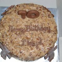 70Th Birthday Cake This is a german chocolate cake with chocolate decorations and numbers for a friend of ours from Sunday School class that was turning 70.