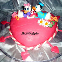 Daisy And Donald Duck Anniversary Cake This was for a couple's anniversary. She loves Daisy, therefore I modeled Donald to go along since it's the couples anniversary...