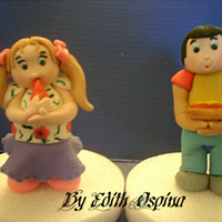 Boy And Girl Enjoying A Snack These were made today for a cake in progress.