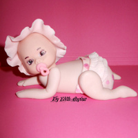 Baby Girl Crawling Modeled out of gumpaste for an upcoming cake.