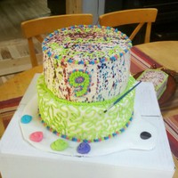 Paint Splatter 2 tier choc and vanilla tye dye with orange buttercream
