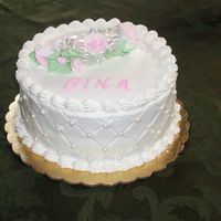 Birthday Cake Cake for a lady at work - lemon cheesecake, with lemon cheesecake flavored buttercream. Didn't have time to make flowers so they are...