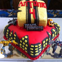 Transformers Cake Transformers cakevanilla bean cake w/ raspberry filling and buttercream fondant & lemon cake w/ lemon filling and lemon fondant