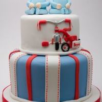 Baby Shower Cake For Twin Boys Parents are pro cyclists, tricycles on the invite, hence the tricycle on the cake. There is another trike on the opposite side of the top...