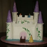 Castle This was my first attempt at making a castle cake. The main castle is made from a double layer 10" sq. then a 6" sq to finish....