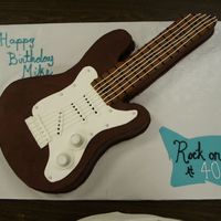 Rocking Guitar I did this cake last week upon a request. Just thrilled with the finished product. I used buttercream with the exception of a fondant...