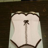Boustier This cake was made for a bridal shower. It was sculpted from a half sheet cake. The entire cake is in buttercream. What a fun little cake....