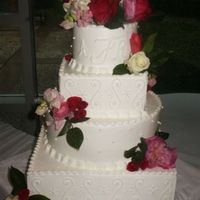 Wedding Cake This was one of my first weddings. Had a great time. Simple but very pretty. Not too much else to say.