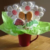 Daisy Cookie Bouquet This is my first cookie bouquet I have sold. They are Sugar Cookies with RI.