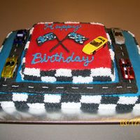 Race Car Birthday Cake My neighbor's little boy had a picture that he just loved and wanted his birthday cake to look like it. He wanted cars on it like the...