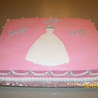 Wedding Gown Bridal Shower Cake 2 layer 11X15 cake with a custard type filling. First time to use Buttercream Dream recipe. Loved it.