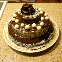 Ganache Cake With Chocolate Modelling Paste First time using chocolate modelling paste (both white and milk chocolate). Three tier cake with fresh strawberry filling. I was just...