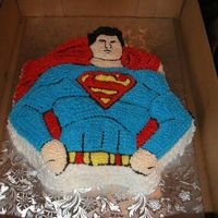 Superman Cake This was made with the old Wilton Pan. I had the add the "S" on his chest with my kopykake projector.