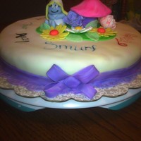 Smurfette In The Garden This cake was made for my son's girlfriend. She i in college and in a speech class. They had to write a 2 minute speech about their...