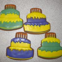 Birthday Cake Cookies Birthday cake cookies made for a friend at work. I think I put the top coat on too soon because it bled a little. Oh well.